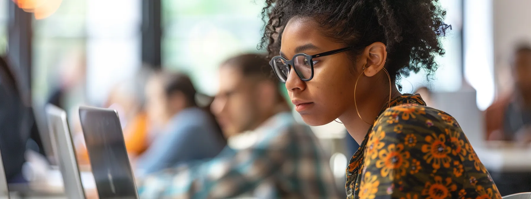 a focused student immersed in hands-on aws training, surrounded by cutting-edge technology and guided by experienced instructors.